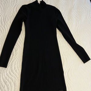 Calvin Klein black dress that designs your body.